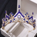 Detailed macro view of baroque golden alloy bridal crown with deep blue crystals in gift box - Gold with Blue Rhinestones