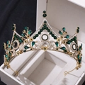 Detailed macro view of a luxury gold bridal crown with green crystals and white rhinestones - Gold with Green Rhinestones