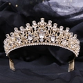 Detailed macro view of golden bridal tiara with green crystals and secure hair comb teeth - With Comb / Gold Tone White Rhinestone