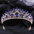 Close-up of golden leaf tiara with green crystal and intricate baroque bridal details - With Comb / Gold Tone Blue Rhinestone