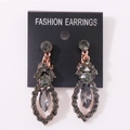 Elegant rose gold drop earrings with grey rhinestone accents on a black display card - Antique Copper Black Rhinestone (Clip-on)