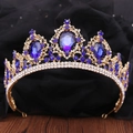 Detail of baroque gold crown with deep blue oval crystals and white rhinestones on black tulle - KC Gold White & Sapphire Blue Rhinestone