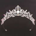 Detail of bridal tiara with sparkling silver leaves and colorful rhinestones on black back - Silver White + AB Rhinestone