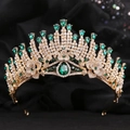 Close-up of golden bridal crown featuring emerald teardrop crystals and white rhinestones - KC Gold White Diamond + Green Diamond