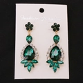 Detail view of vintage emerald green water drop earrings with sparkling crystal accents - Gold Green Earring Post Earrings