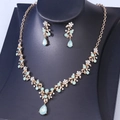 Elegant gold-tone bridal jewelry set with V-shaped rhinestone necklace and teardrop earrings - Gold Jelly Green