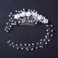 Detail of handmade bridal hair comb with white resin flowers and pearl vine decoration - Silver White Hair Comb