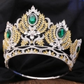 Macro view of luxury bridal tiara with green emerald stones and yellow marquise crystals - Silver Yellow and Green Rhinestone Adjustable