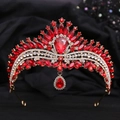 Detailed close-up of a bridal crown featuring red crystals and a pear-shaped pendant drop - KC Gold White Diamond + Large Red Diamond