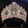 Detailed view of pink gemstone pageant crown with golden alloy feathers and hair comb base - Hair Comb Style / KC Gold White + Light Pink Rhinestone