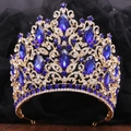 Close-up of golden bridal crown with blue marquise crystals and white rhinestones - KC Gold (White and Royal Blue Rhinestone)