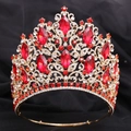 Detailed close-up of luxury Baroque golden crown with ruby red and clear crystals - KC Gold (White and Red Rhinestone + Adjustable Crown)