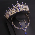 Detailed macro view of bridal jewelry set with blue gemstones and baroque gold crown - KC Gold White And Royal Blue Rhinestone (Earring Post)