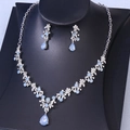 Detail of bridal jewelry set featuring blue teardrop crystal necklace and earrings - Silver Jelly Blue Rhinestone