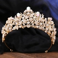 Close-up of golden leaf crown featuring shimmering rhinestones and pear-shaped gemstones - KC Gold White Diamond + AB Diamond
