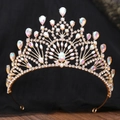 Detail showing gold baroque crown with marquise crystals on a black background - KC Gold White Diamond + AB Diamond