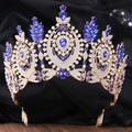 Detailed macro view of baroque gold tiara with blue rhinestones and secure metal combs - KC Gold White Rhinestone Royal Blue Stone (With Comb)