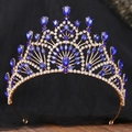 Detailed view of Baroque gold bridal crown featuring dark blue crystals and rhinestones - KC Gold White & Sapphire Blue Rhinestone