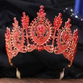 Macro shot of the luxurious gold tiara featuring ruby red rhinestones and intricate details - KC Gold Full Red Rhinestone (With Comb)