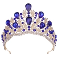 Detailed macro view of the gold crown featuring royal blue teardrop crystals and floral designs - KC Gold White & Sapphire Blue Rhinestone