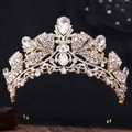 Macro shot of gold bridal tiara with sparkling crystal teardrops and intricate alloy metalwork - KC Gold With White Rhinestone