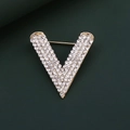 Macro shot of V-shaped gold brooch with inlaid rhinestones on dark green background - Small / Gold