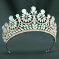 Detailed front view of gold bridal crown featuring mint green gems and crystal accents - Gold/Green