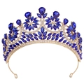 Detail of golden bridal tiara featuring blue teardrop crystals and white rhinestones - Gold/Royal Blue