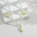 Dettaglio della collana di perle con ciondoli in ceramica a tulipano e maglie dorate - Stile Pesce dei Cartoni Animati dell'Oceano Verde (Style 3)