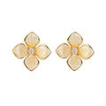 Detailed macro view of enamel flower earrings with gradient petals and central zircon inlay - Yellow Amber Texture