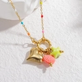Detail of colorful beads with golden heart shell and star pendants on a beach style necklace - Heart Pendant