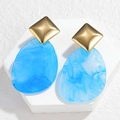 Detailed close-up of sky blue resin drop earrings with marble texture and gold square studs - Blue (S-E1169-lan)