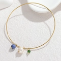 Detalle del brazalete de titanio dorado con piedra azul, perla blanca y cristal verde - Estilo Cuenta Azul Verde (S-B1226-lvlan)