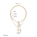 Detail showing dimensions of layered stainless steel gold necklace with cross and moon charms - Star Moon Cross Pendant Style (SFLN2263)