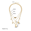 Gold layered stainless steel necklace with sun, moon and elephant charms detail - Sun Elephant Star Moon Pendant Style (SFLN2264)