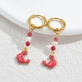 Handcrafted ocean-themed gold hoop earrings with red enamel crab and pearl dangles - Red Crab / Gold