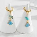 Golden ocean earrings featuring pearl, turquoise, and blue enamel fish charms - Blue Fish / Gold
