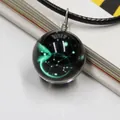 Constellation necklace with green luminous glass sphere pendant on black leather cord - Sagittarius