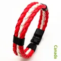 Detail view of woven leather bracelet with Canadian flag red and white colors and clasp - Canada Style