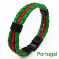 Close-up of handmade green and red woven leather bracelet with black buckle closure - Portugal Style