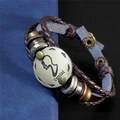 Détail du signe Gémeaux sur bracelet en cuir tressé avec fermoir en bronze antique - Gémeaux