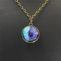 Detailed macro view of the celestial nebula glass pendant with bronze metal frame - Blue Purple Nebula (4)