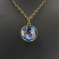 Close-up of vintage bronze necklace featuring a double-sided solar system glass pendant - Starry Universe (6)