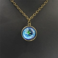 Macro view of vintage bronze necklace with double-sided Earth glass ball pendant - Earth Home (7)