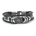 Detail of multi-layer leather bracelet with silver metal rings and vintage carved disc - Round Style 1