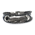 Macro view of multi-layer leather bracelet featuring vintage metal feather pendant - Leaf