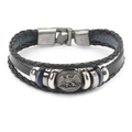 Close-up of multilayer leather bracelet with eagle charm and vintage buckle - Eagle 1