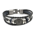 Detail showing multi-layer vintage leather bracelet with metal beads and sun totem badge - Round 3