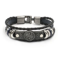 Detail of multi-layer braided leather bracelet with silver yin yang charm and beads - Yin Yang
