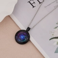 Detailed macro view of a Pisces constellation necklace with purple starry sky pendant - Pisces